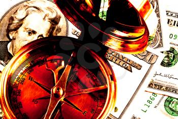 Royalty Free Photo of a Compass and Money