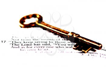 Royalty Free Photo of a Skeleton Key on a Bible