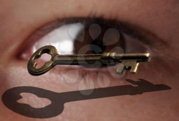 Royalty Free Photo of a Person Looking at a Key