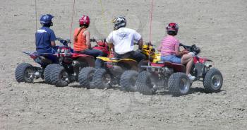 Royalty Free Photo of People on All Terrain Vehicles