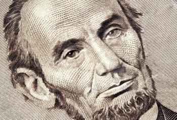 Royalty Free Photo of Abraham Lincoln on a Five Dolllar Bill