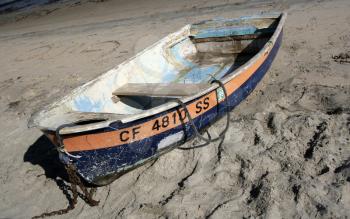 Royalty Free Photo of a Dinghy on a Beach