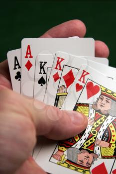 Royalty Free Photo of a Person Playing Cards