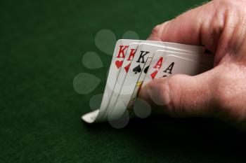 Royalty Free Photo of a Person Playing Poker