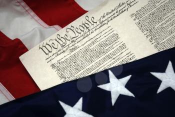 Royalty Free Photo of the U.S. Constitution and Betsy Ross Flag