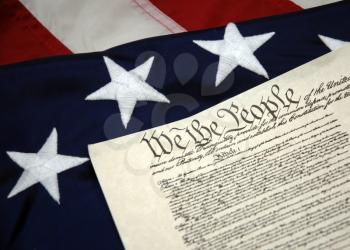 Royalty Free Photo of the U.S. Constitution and Betsy Ross Flag