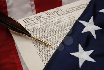Royalty Free Photo of the U.S. Constitution And Betsy Ross Flag