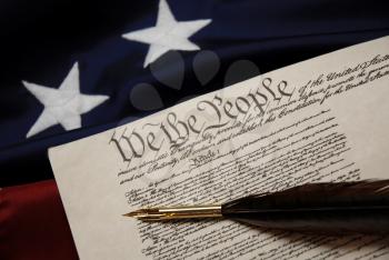 Royalty Free Photo of the U.S. Constitution And Betsy Ross Flag