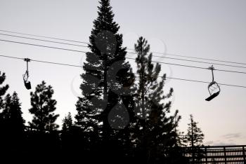 Royalty Free Photo of Ski Lifts Silhouetted