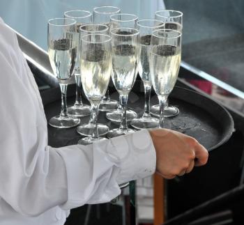 Royalty Free Photo of a Person Serving Champagne