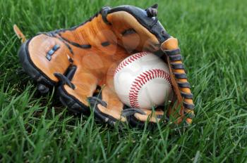 Royalty Free Photo of a Baseball in a Glove