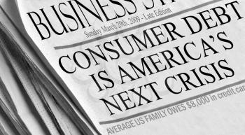 Royalty Free Photo of a Newspaper Headlines About Consumer Debt