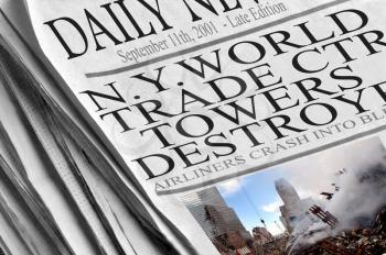 Royalty Free Photo of a  Newspaper Documenting the 9-11 Attacks