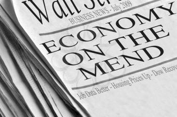 Royalty Free Photo of an Economy Headlined Newspaper