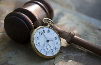 Royalty Free Photo of a Gavel and Pocket Watch