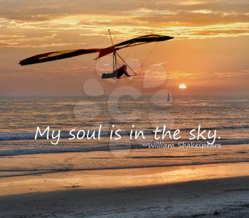 Royalty Free Photo of a Hangglider and Shakespeare Quote