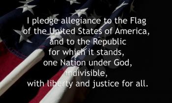 Royalty Free Photo of an American Flag With the Pledge of Allegiance
