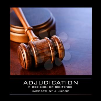 Royalty Free Photo of a Gavel and Definition of Adjudication
