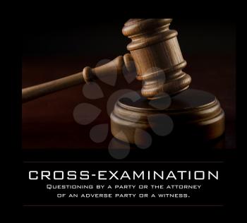 Royalty Free Photo of a Cross-Examination Background With a Gavel