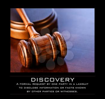 Royalty Free Photo of a Gavel With a Definition of Discovery
