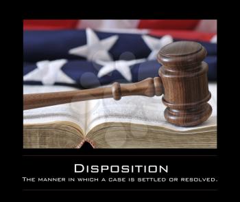 Royalty Free Photo of a Gavel, Book and American Flag With the Definition of Disposition