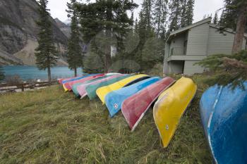 Canoes stacked near Moraine Lake, Banff, Alberta, Canada.