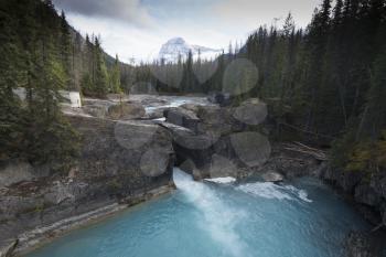 Natural Bridge, just outside of the city of Field. Field is an unincorporated community of approximately 169 people located in the Kicking Horse River valley of southeastern British Columbia, Canada, 