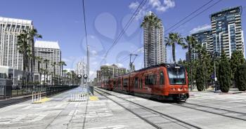 Royalty Free Photo of a Red Trolley in Downtown San Diego, California, USA