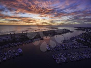 Royalty Free Photo of Pink skies at the Oceanside Harbor - Aerial Panoramic at sunset in Oceanside.