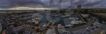 Royalty Free Photo of an aerial panoramic of the Oceanside Harbor at sunset. Oceanside is 35 miles North of San Diego, California, USA