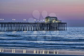 Royalty Free Photo of Sunset Closeup of the end of the Oceanside Pier, Oceanside, California, USA.