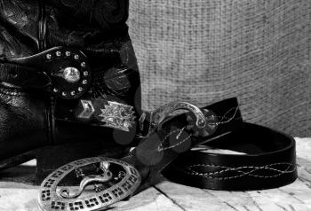 Royalty Free Photo of a Western Boot and Belt
