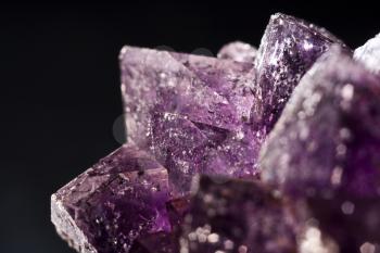 Royalty Free Photo of a Purple Amethyst Against Background