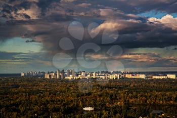 Royalty Free Photo of an Urban Landscape in the Fall Under Threatening Skies