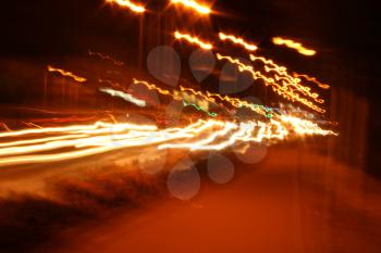 Royalty Free Photo of Car and Street Lights at Night