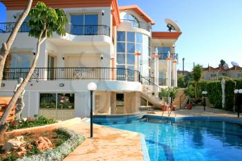 Royalty Free Photo of a Villa With a Swimming Pool
