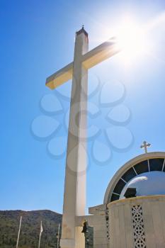Royalty Free Photo of a Cross and Church