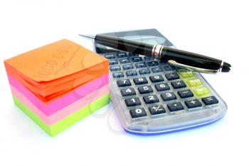 Royalty Free Photo of a Calculator and Notes