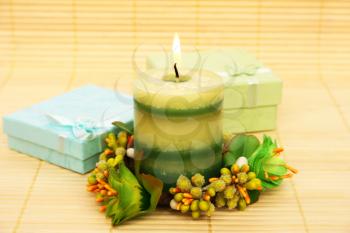 Royalty Free Photo of a Candle and Presents