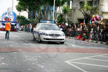 Royalty Free Photo of a Police Car Apart of a Parade