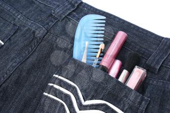 Royalty Free Photo of Cosmetics in Blue Jeans
