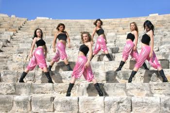 Royalty Free Photo of Dancers on the Stairs of the Kourion Amphitheatre