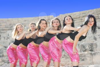 Royalty Free Photo of Dancers on the Stairs of the Kourion Amphitheatre