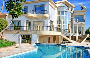 Royalty Free Photo of a Villa and Swimming Pool