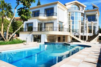 Royalty Free Photo of a Villa and Swimming Pool