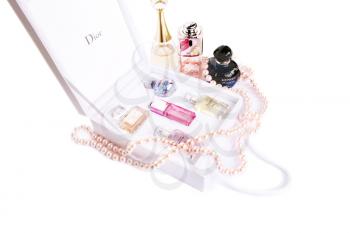 Royalty Free Photo of a Dior Set of Perfume and Pearls