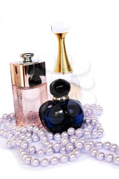 Royalty Free Photo of Perfume Bottles and Pearls