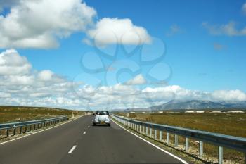 Royalty Free Photo of a Car on the Road