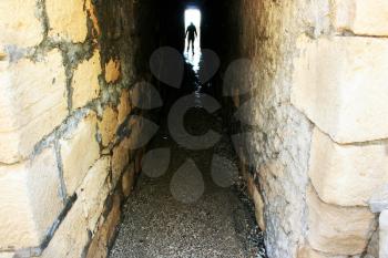 Royalty Free Photo of a Person at the End of a Tunnel