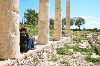 Royalty Free Photo of a Tourist at Temple Ruins in Amathus, Cyprus